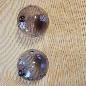 Pair of hand-made purple/pink glass Xmas ornaments with holes